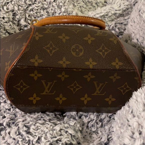 Authentic Eclipse PM Monogram Louis Vuitton - Picture 12 of 15